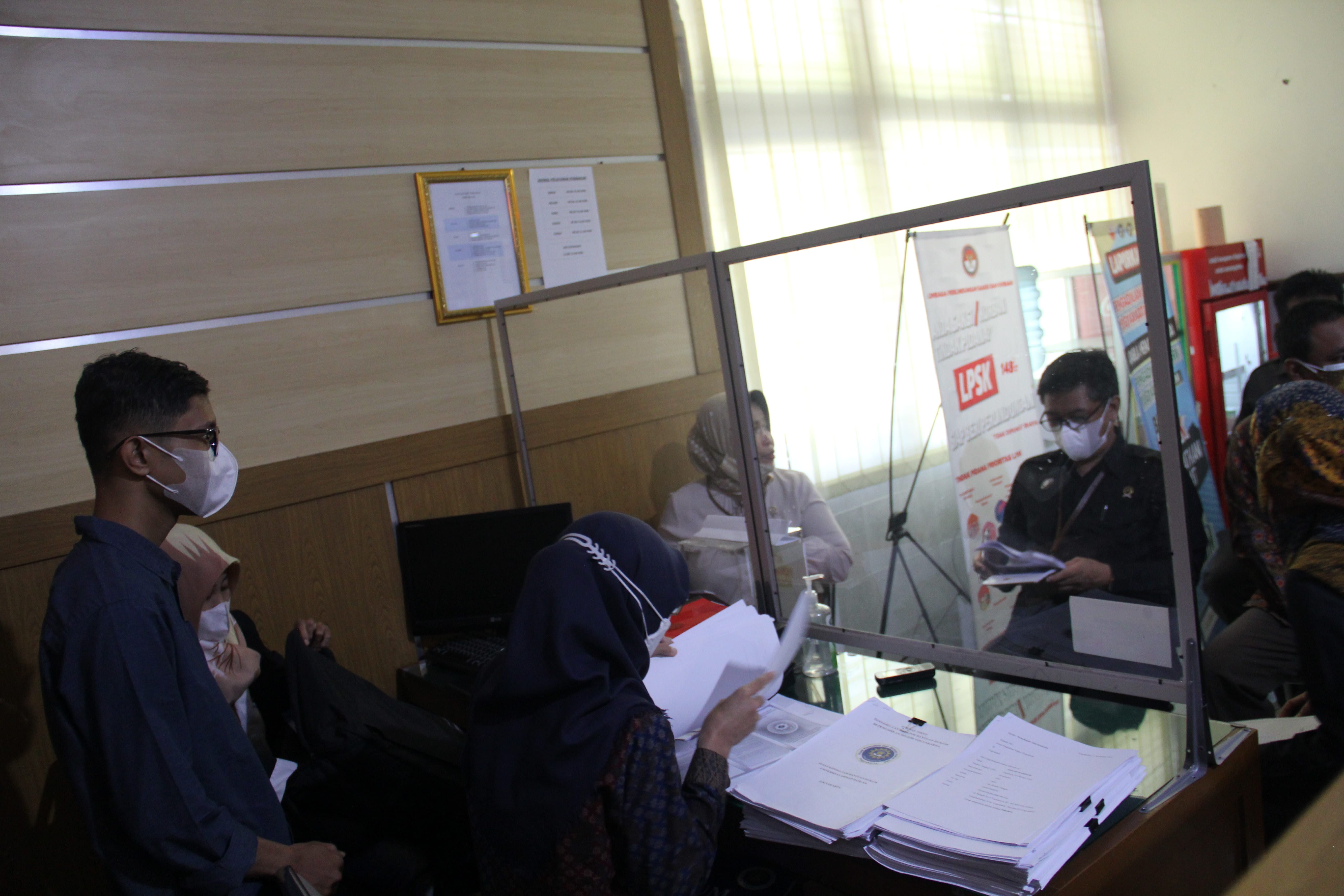 Monitoring dan Evaluasi Pos Bantuan Hukum (Posbakum) Desember 2021 